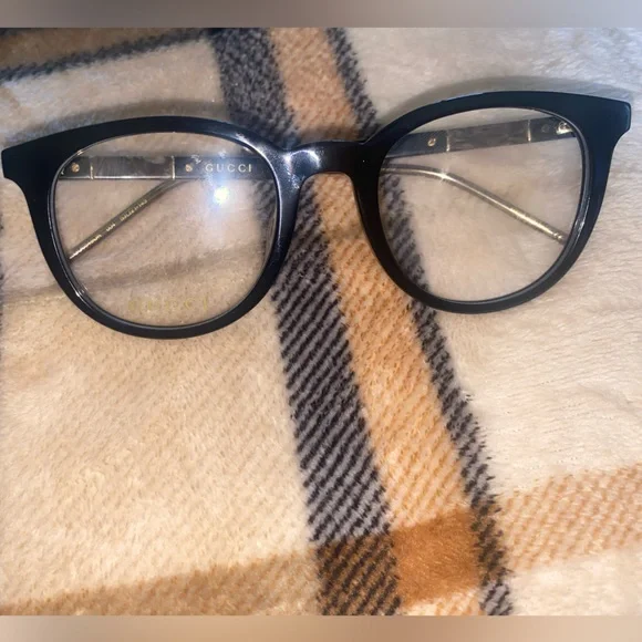 Gucci glasses with authentication card, dust bag, and case